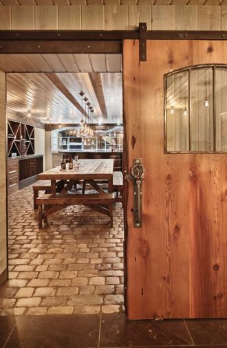 Charlie, contractor Sam Beazley of Beazley Construction, and Pedro Valdez, Beazley’s lead carpenter, tackled the wine cellar design. To create a more rustic look, they used imported split sanded cobblestones - once used as ballast in ships sailing to Colonial America - as the flooring.