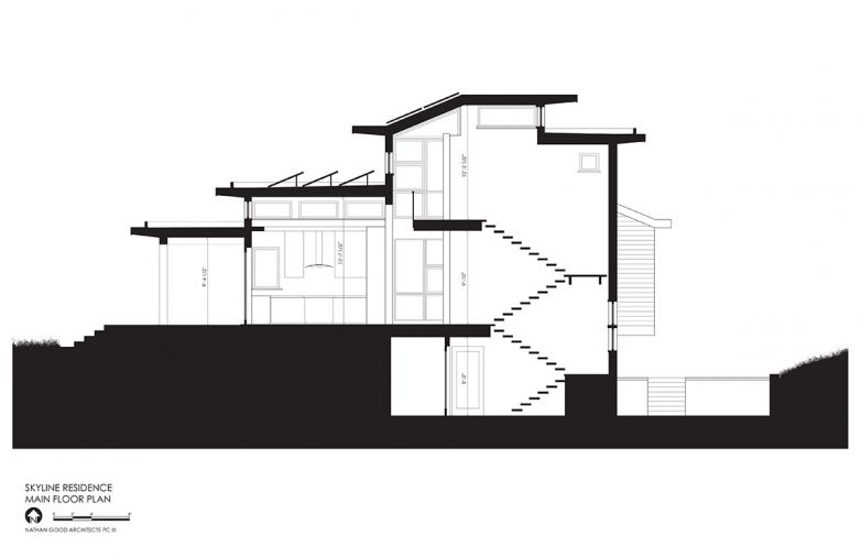 An earlier single-level layout made the home lose cohesion, with bedrooms too remote from the core of the home. To keep the family connected, the architects opted for a two-story bedroom wing adjacent to the kitchen and great room. On the bottom floor, a daylight basement houses recreation amenities and a walk-out patio with a hot tub.