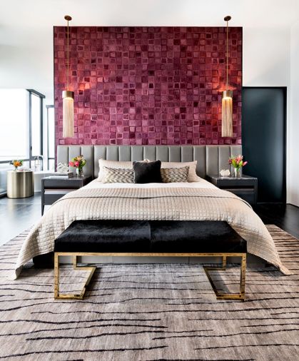 Kyle Bunting pink cowhide wallcovering crowns gray channel back Restoration Hardware headboard and HBB Studio nightstands. Black cowhide and brass bench by Worlds Away. Mombasa Rug by Feizy Rugs.