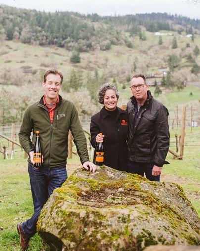 Associate Winemaker Wade Smith with Gloria and Stephen Reustle of Reustle Prayer Rock Vineyards.