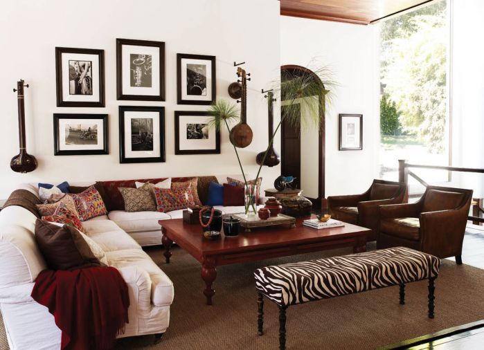 Assorted antique batik and tribal fabric pillows give character to the living room designed for easy entertaining.