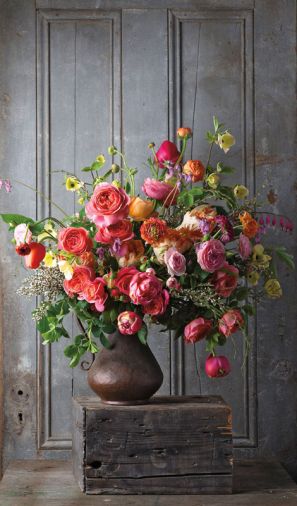 Going Dutch: Finding inspiration in Flemish floral still lifes, a wild and romantic bouquet of garden roses, dogwood, ranunculus, tulips, bleeding hearts and hellebores.