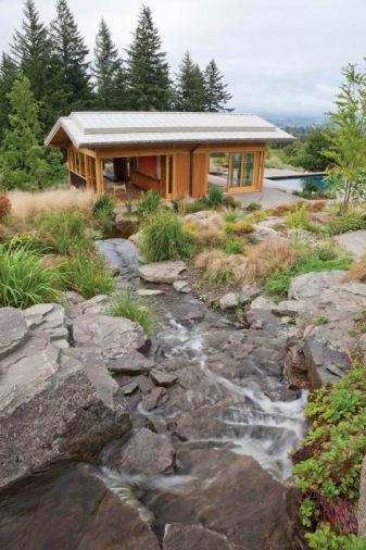 The rocks were imported, and individually placed in the tumbling water feature designed by Eamonn Hughes of Hughes’ Water Gardens. Originally from Ireland, Hughes has been designing Zen-inspired water features like this one in Oregon since 1987.