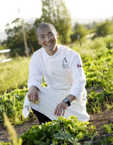 JORY Restaurant Executive Chef Sunny Jin harvesting fresh herbs from the one-acre chef’s garden.