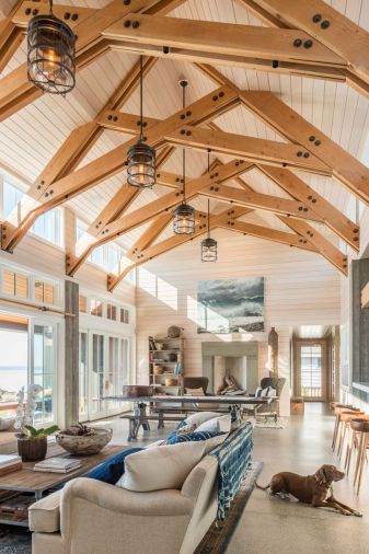 John loves how the exposed structural components of the
house, like these Douglas fir beams and the concrete pilings,
give the home a slightly industrial, boat house-type feel.