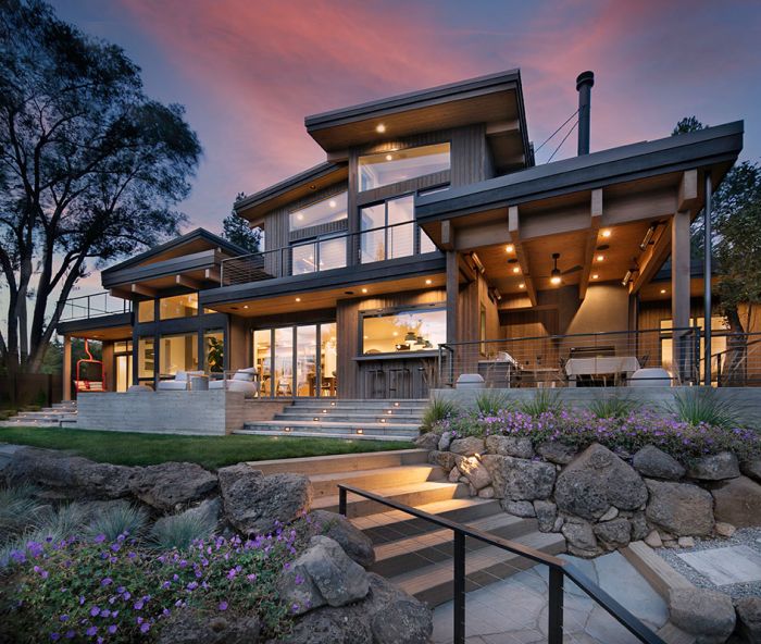 In this 3,800-square-foot custom house on the Deschutes River in Bend, Oregon, the Marvin windows and doors, and La Cantina folding door were sourced from Parr Lumber.