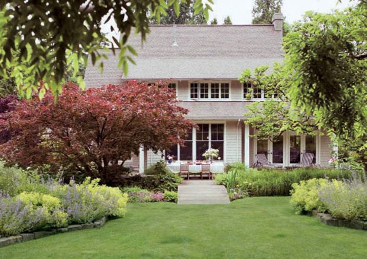 “The garden should curtsy to the house,” said English garden designer Gertrude Jekyll. The abundance of these plantings are not allowed to overwhelm the views of the house, or the view out of the house into the garden. Mirror image flower borders frame the view and define the approach from the cutting garden proper to the house. Access to the terrace is both obvious and inviting.