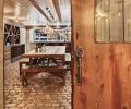 Charlie, contractor Sam Beazley of Beazley Construction, and Pedro Valdez, Beazley’s lead carpenter, tackled the wine cellar design. To create a more rustic look, they used imported split sanded cobblestones - once used as ballast in ships sailing to Colonial America - as the flooring.