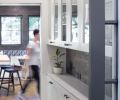 The original interior French doors were repurposed as pocket doors.