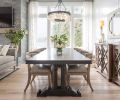 The dining room prominently features geometric motifs with vertical axes of symmetry, including a custom-installed chevron wall that gives a contemporary nod to bead board, a classic adornment to many coastal New England homes. The furnishings in this home were sourced from a wide range of vendors: “I look everywhere!” says Baines. “I don’t like things to match, so I scour all the resources we can find.”