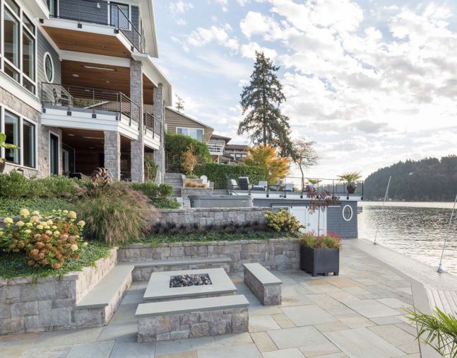 Outdoor entertainment spaces are integrated into each level of the home.
