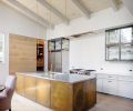Byskiniewicz was looking for rich, earthy, and beautiful materials for the kitchen island to distance the look from the previous mountain lodge style.