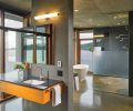 The bathroom features concrete as well as American black basalt in a flamed finish.