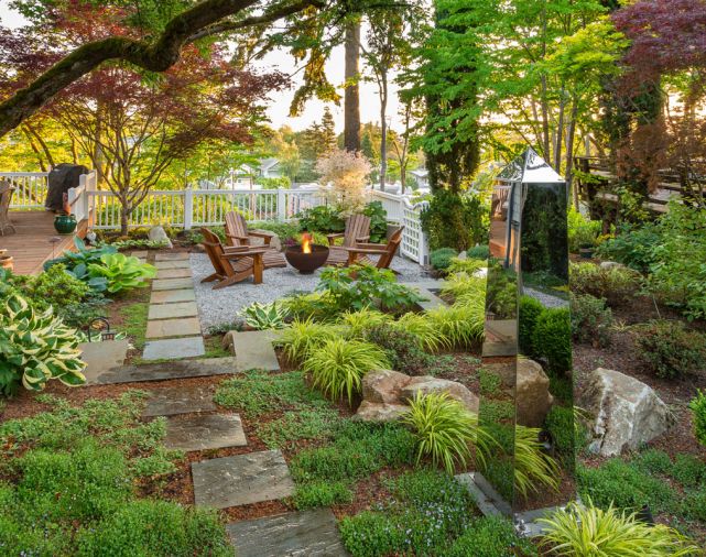 To design a modern yard to complement a traditional home, a Seattle landscape is created with elements that combine the homeowner’s Virginia childhood with plants native to the Northwest.