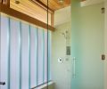 Vertical channel glass shower.