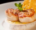 Seared Diver Scallops, a signature dish at Alchemy Restaurant & Bar 
in The Winchester Inn.