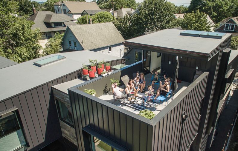 The rooftop deck is secluded yet still “makes you feel connected to the city,” says Tate.