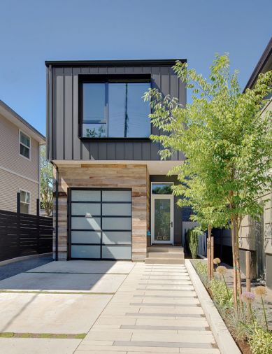 The receded garage presents a modest street view.