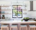 Zinc pendants by Urban Electric Co. add a cool industrial feel to the new kitchen. Miele range, hood and refrigerator continue the clean lines.