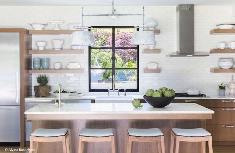 Zinc pendants by Urban Electric Co. add a cool industrial feel to the new kitchen. Miele range, hood and refrigerator continue the clean lines.