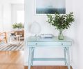 Heidi created a “color nook” in the dining room to bring a focal point into the space. She says blue often reads as neutral, making it a particularly versatile color. As part of the remodel, the homeowners also had the exterior of the home repainted from brown to slate blue.