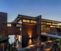 The upper level’s clerestory windows glow as early evening sweet light falls over the Cliff House.