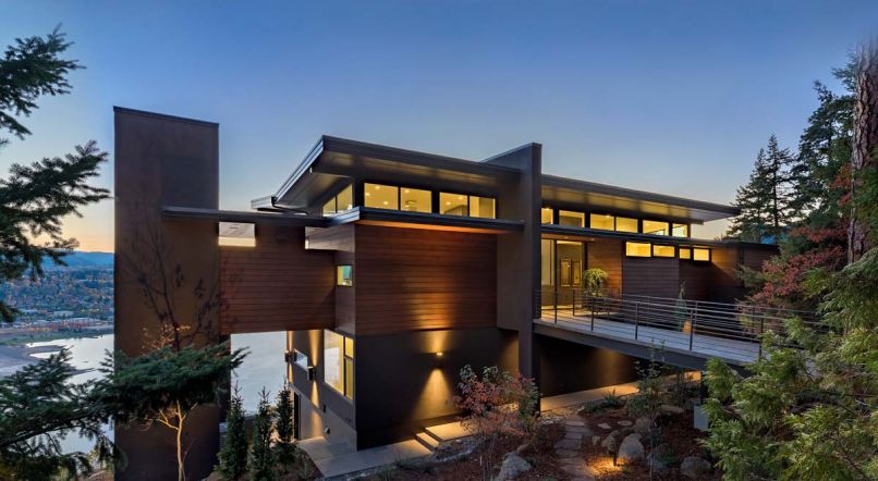 The upper level’s clerestory windows glow as early evening sweet light falls over the Cliff House.