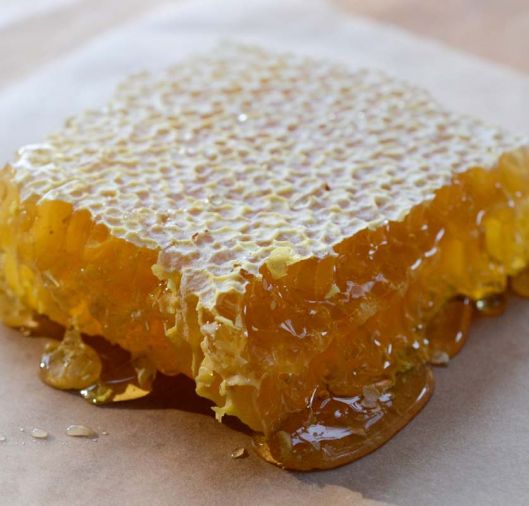 Old Blue Raw Honey sells a limited amount of honeycomb, which makes a beautiful centerpiece for a cheese board.