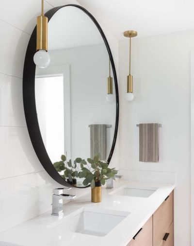 The “Boys Bathroom” maintains lightness with white tiles from Pratt and Moss.