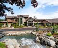 The 9200 sq. ft. home needed, the husband felt, a water feature that could stand up to its width and breadth. A handy secondary drop-off zone to the left of the entrance is for the children, which leads directly into the mud room.