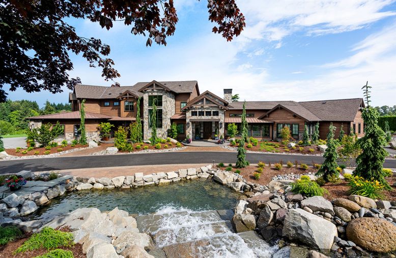 The 9200 sq. ft. home needed, the husband felt, a water feature that could stand up to its width and breadth. A handy secondary drop-off zone to the left of the entrance is for the children, which leads directly into the mud room.