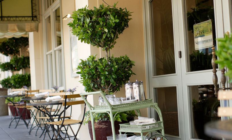 Many restaurants set up tables along Lithia Creek in season for al fresco dining.