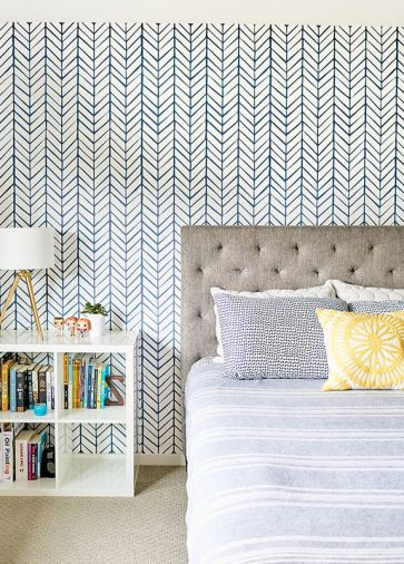 Detailed geometric wallpaper is used in multiple locations in the home, including one of the children’s bedrooms and the powder room. “Coming from the white, gallery-like halls and encountering a striking, textural pattern really makes it feel like a special space,” says Jenny.