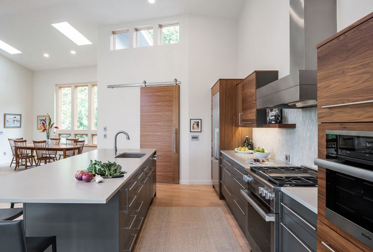 A wide galley and expansive island make this a true two-person kitchen, with ample space for guests on the other side of the island.