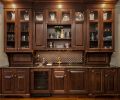 Great room walnut cabinet with Cambrian black granite border, pencil liner and Solistone Tessen Arabesque.