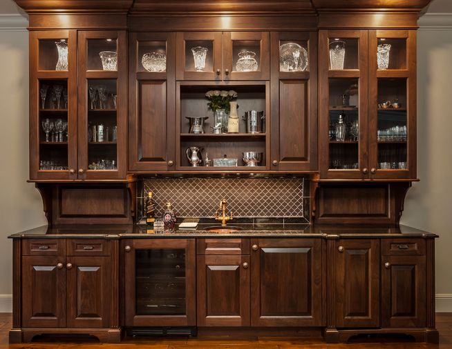 Great room walnut cabinet with Cambrian black granite border, pencil liner and Solistone Tessen Arabesque.