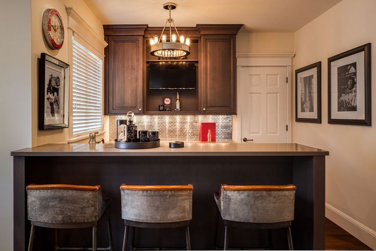 Upstairs bar with Four Hands recycled tin-backed leather stools.