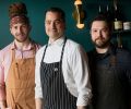 Executive Chef Patrick McKee (center) heads the Estes chef concept at Dame Collective. Photography © John Valls