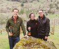 Associate Winemaker Wade Smith with Gloria and Stephen Reustle of Reustle Prayer Rock Vineyards.