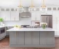 CABINETRY A standout in the mostly white kitchen, the mid-tone gray hue from Benjamin Moore on the cabinets is augmented by the gold in the hardware. COUNTERS + LIGHTING White Space chose Pental Quartz countertops with a subtle, yet warm veining to add interest but keep the kitchen’s clean, uncluttered aesthetic.