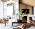 The remodel retained many of the classic midcentury components of the home, like an offset fireplace and the wood paneled ceiling.
