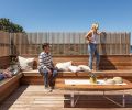 The Outdoor space was a central focus for this remodel, including a new deck constructed on top of the home’s existing garage with Ipe, a super-strong tropical hardwood. “Ipe is very durable and low maintenance,” says Matt. “And it weathers naturally to a nice silver color.” Built-in benches on the deck mirror the benches constructed inside, creating an enhanced sense of flow between the indoors and the outdoors.