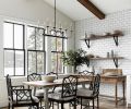 Open shelving in the dining room is designed as a venue to display items from the client’s collection, and is backed by a feature subway-tiled that continues through to the kitchen. A new mudroom done in white shiplap serves as a connection between the added carriage house and garage and features the white oak flooring found throughout the home. Windows by Sierra Pacific.