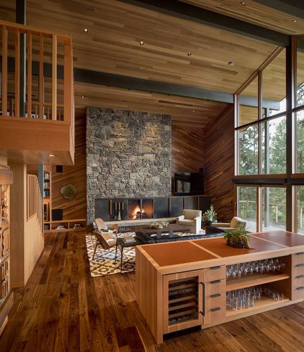 Energy efficiency and quality systems were a priority for the client, along with using quality and natural local materials appropriate for the Black Butte location. Montana Moss stone, for example, is found in abundance, including behind the great room’s striking Ponderosa Forge fireplace. Clad in fir and cedar, the room’s ceiling lines mimics the exterior roof slope, as do those in the rest of the home, creating an elevated wood lodge vibe and enhancing the distinct indoor-outdoor connection.