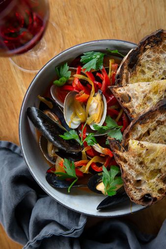 Clams and Mussels with Saffron and Peppers – a San Sebastian inspired dish.