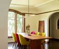 A new arched opening replaced the efficiency dining room door. Christopher Boots’ Simple Negative pendant light illuminates Solo chairs by Neri & Hu for De La Espada.