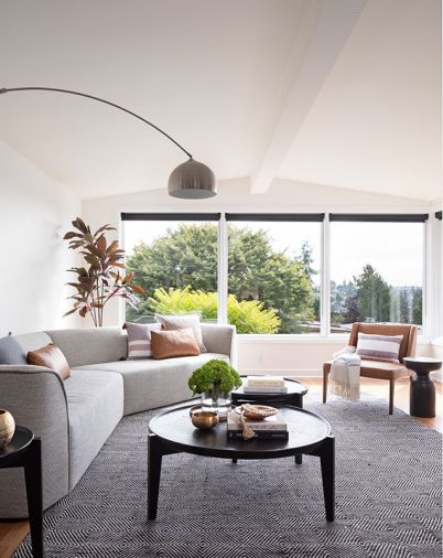 The temptation was to face the sofa towards the view, but a more oblique arrangement makes the living room more inviting for gathering while still letting loungers take in the vista.