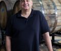Lee Madoff, founder and owner of Bull Run Distillery, poses at his Northwest Portland barrel house and tasting room. A second Bull Run tasting room opened in Carlton, Oregon, in 2018.