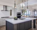 Paramount for the kitchen of this Gleneden Beach retreat was to merge the indoors and out, and to lighten a once dark, cavelike feel. “The challenges were to create a large open space and maintain the structural integrity of the loft above,” says C&R Design Remodel co-owner Beth Rhoades. “This required beams over the kitchen’s new location. We also needed to address the cooktop ventilation. The end result was to sheetrock those to have them disappear in the space.”