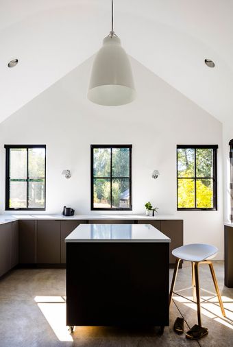 Johnson designed Artiss’s ceramic workshop with easy-to-clean concrete floors. An oversized Fritz Hansen Caravaggio pendant hangs over the central worktable.